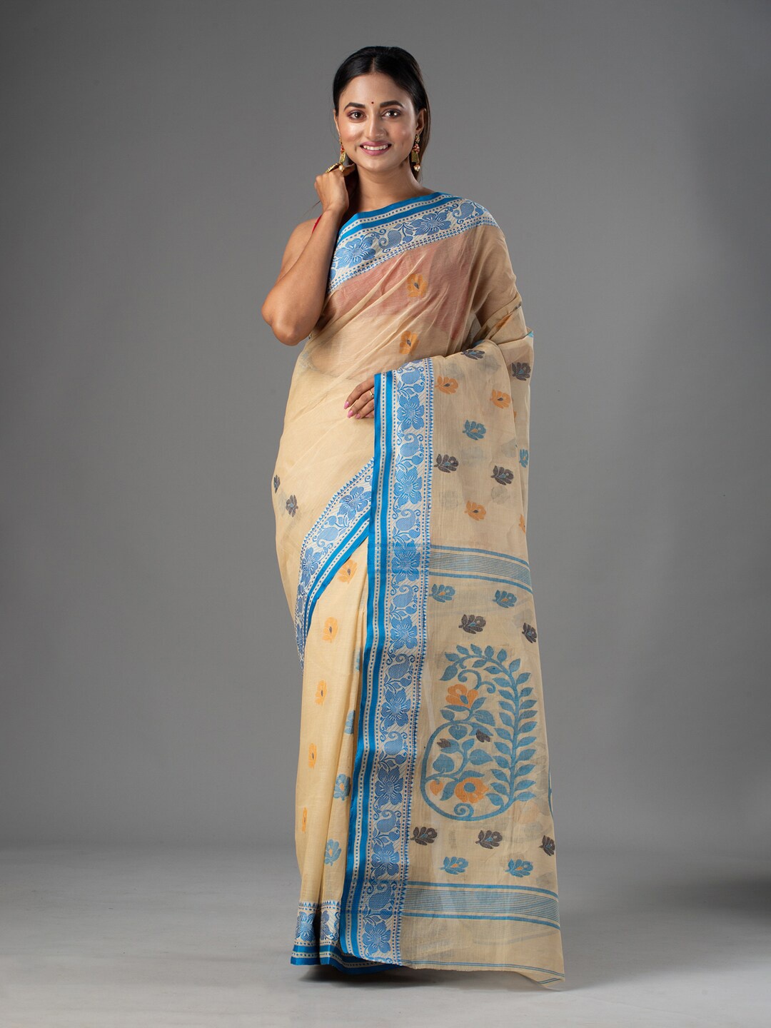 

Mitera Beige & Blue Woven Design Pure Cotton Taant Saree