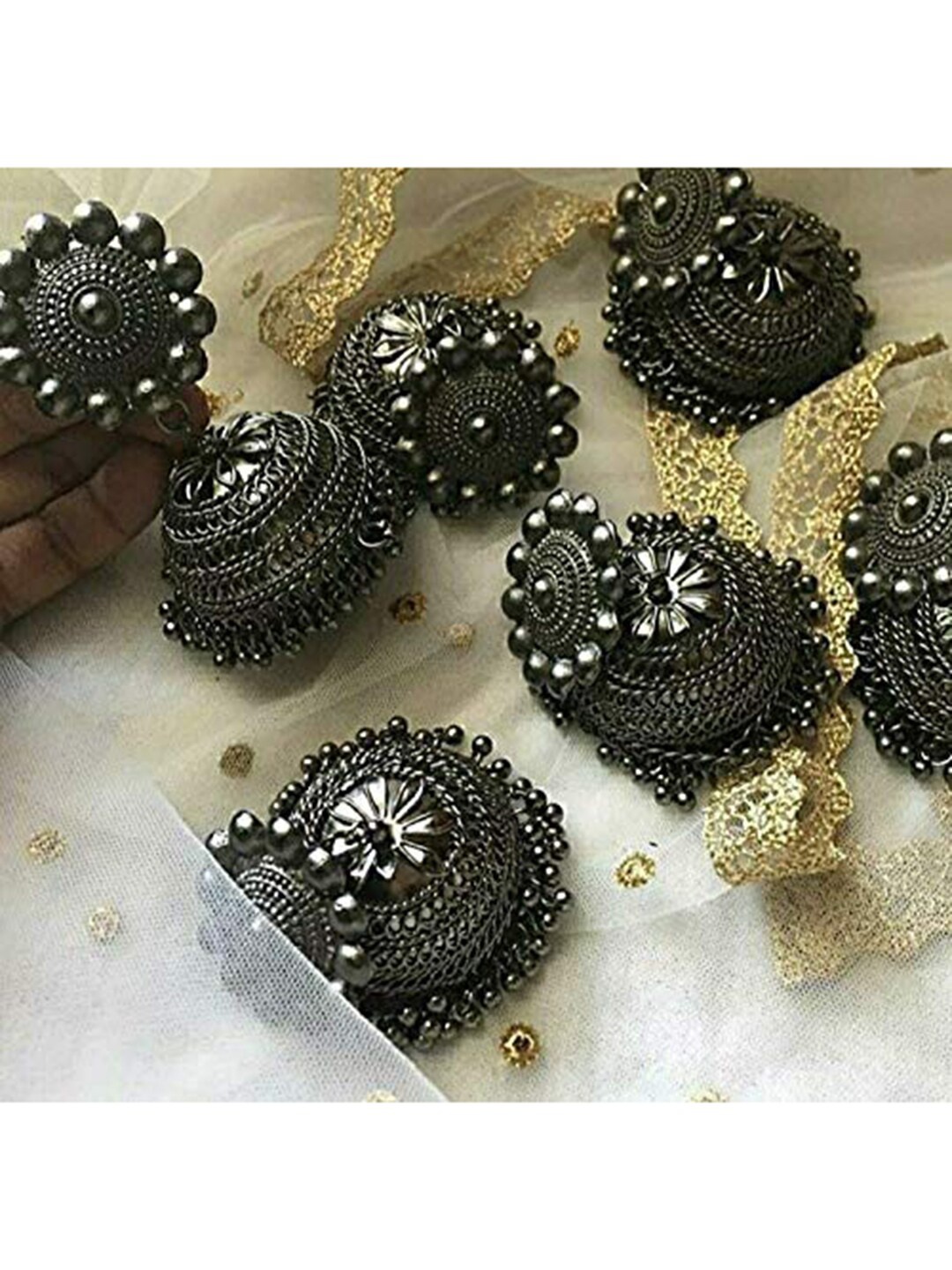

Vembley Silver-Plated Dome Shaped Jhumkas Earrings