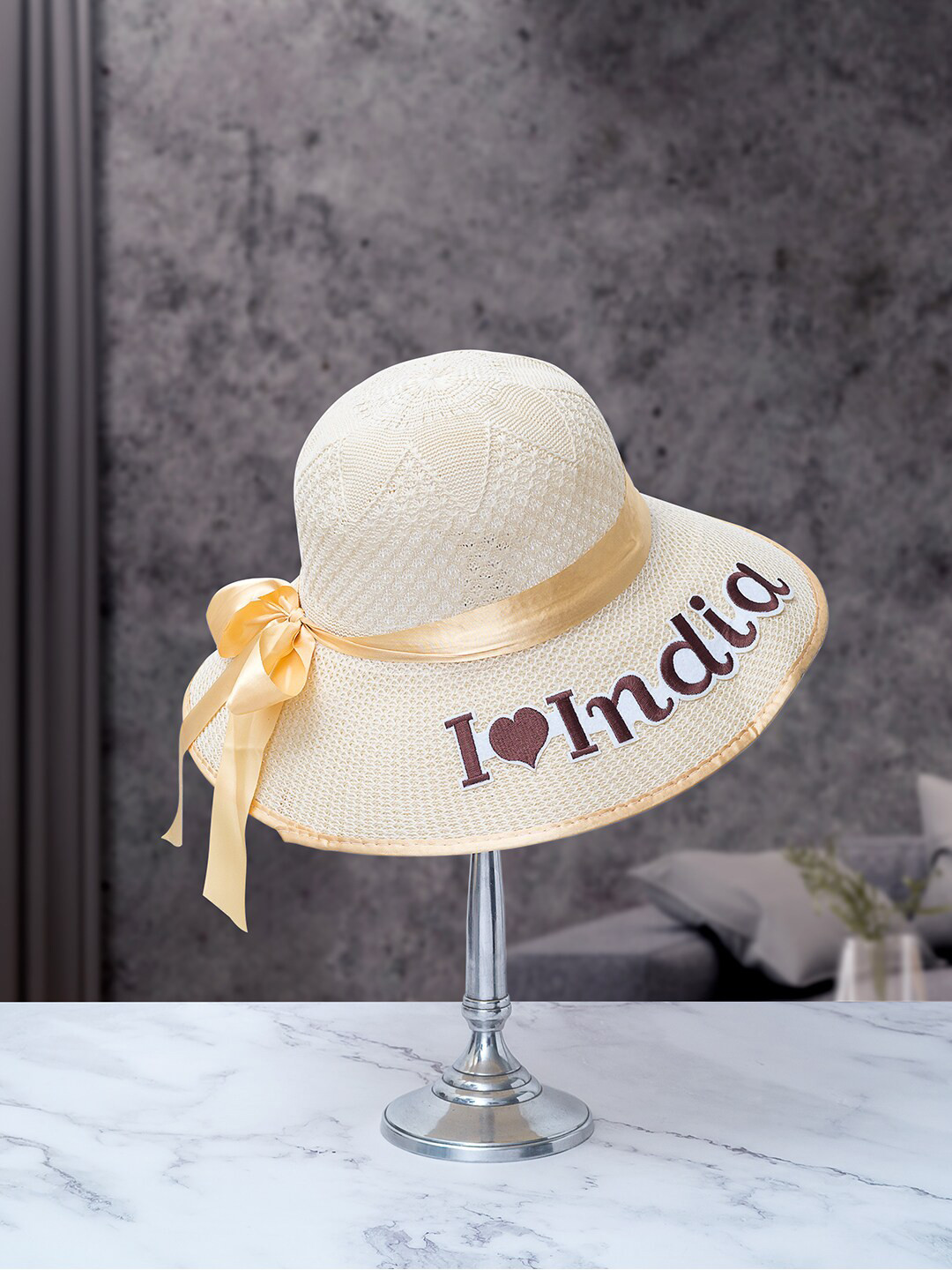 

Golden Peacock Women Cream Straw Woven Design Sun Hat