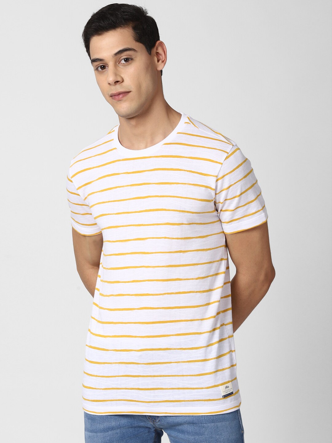 

Peter England Casuals Men White & Orange Striped Pure Cotton Slim Fit T-shirt
