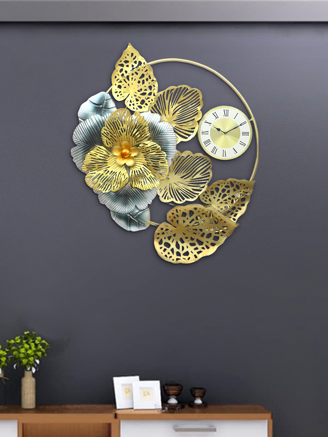 

Aapno Rajasthan Gold-Toned Leaf Hanging Wall Clock