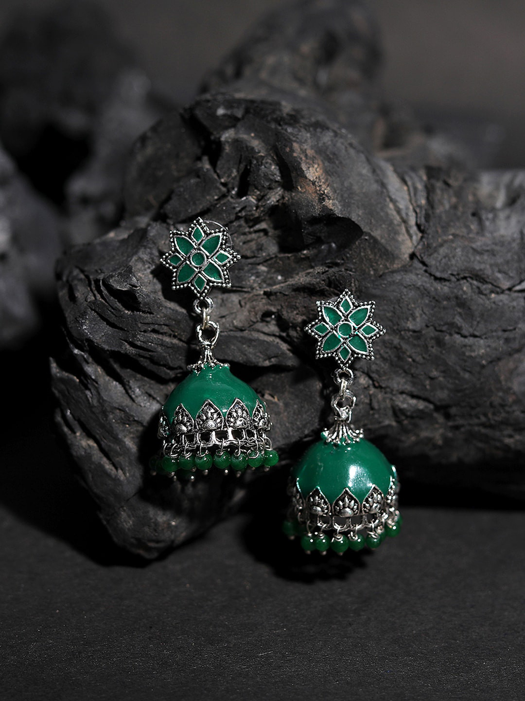 

Yellow Chimes Silver-Toned & Green Brass-Plated Oxidised Jhumkas Earrings