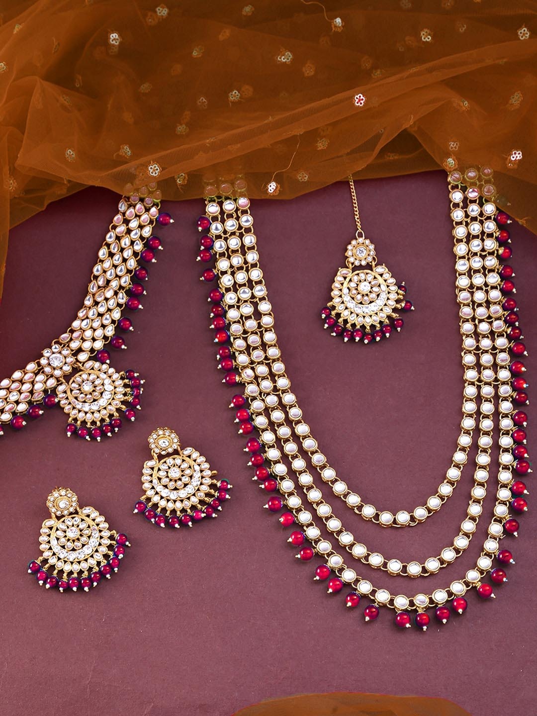 

Yellow Chimes Gold-Plated White & Red Kundan-Studded & Beaded Jewellery Set