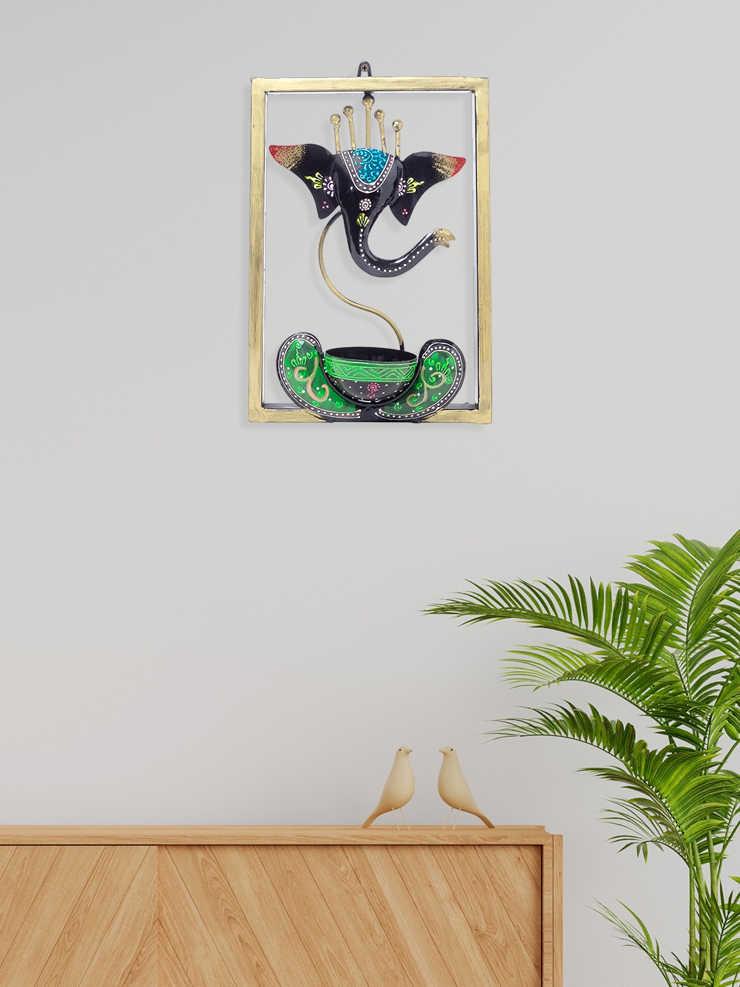 

Golden Peacock Black & Blue Ganesh Tea-Light Holder Wall Decor