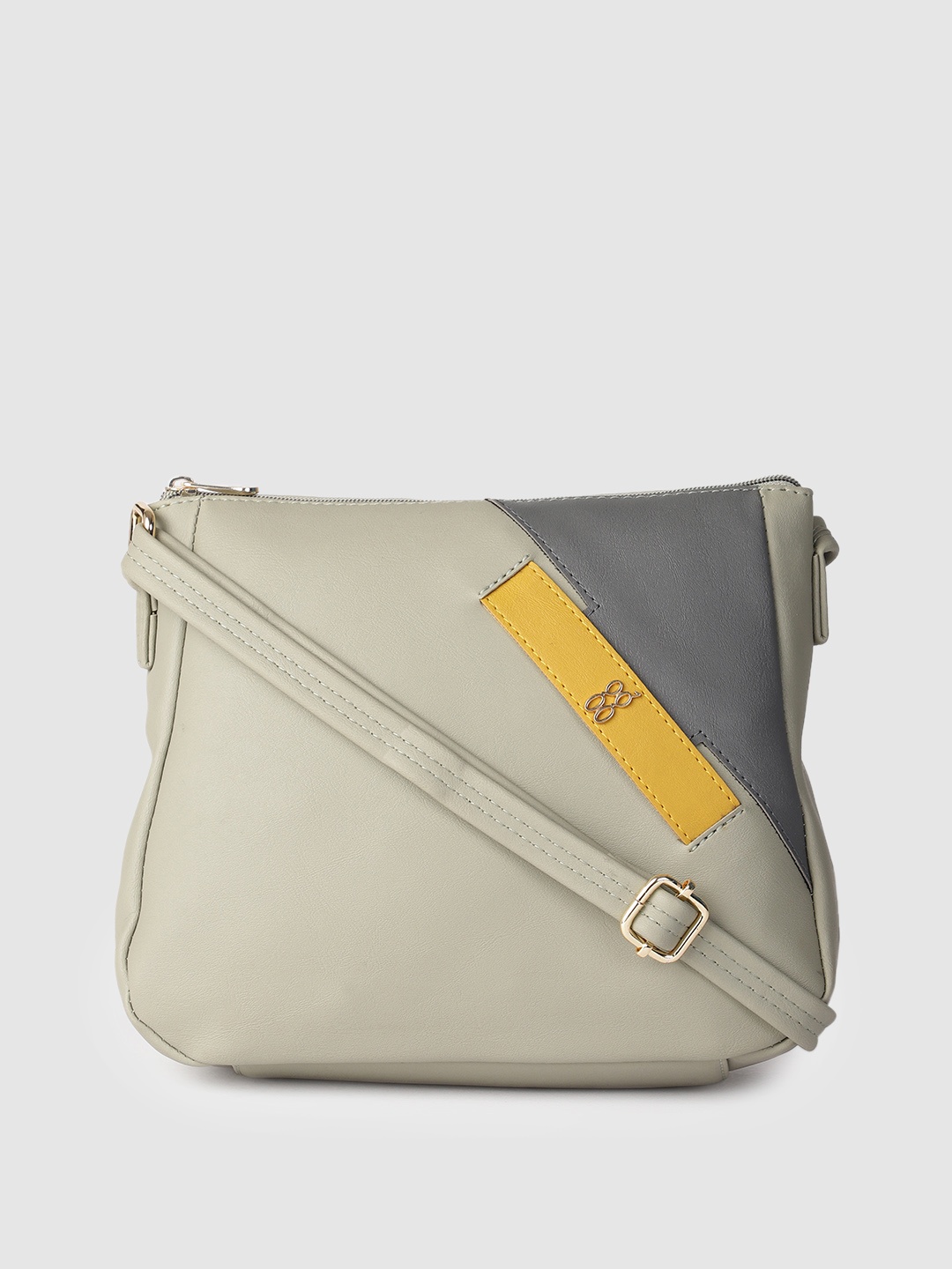 

Baggit Mint Green Solid Regular Structured Sling Bag with Applique Detail