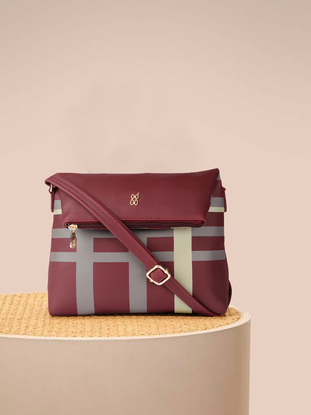 

Baggit Burgundy & Silver-Toned Solid Regular Structured Foldable Sling Bag with Checks