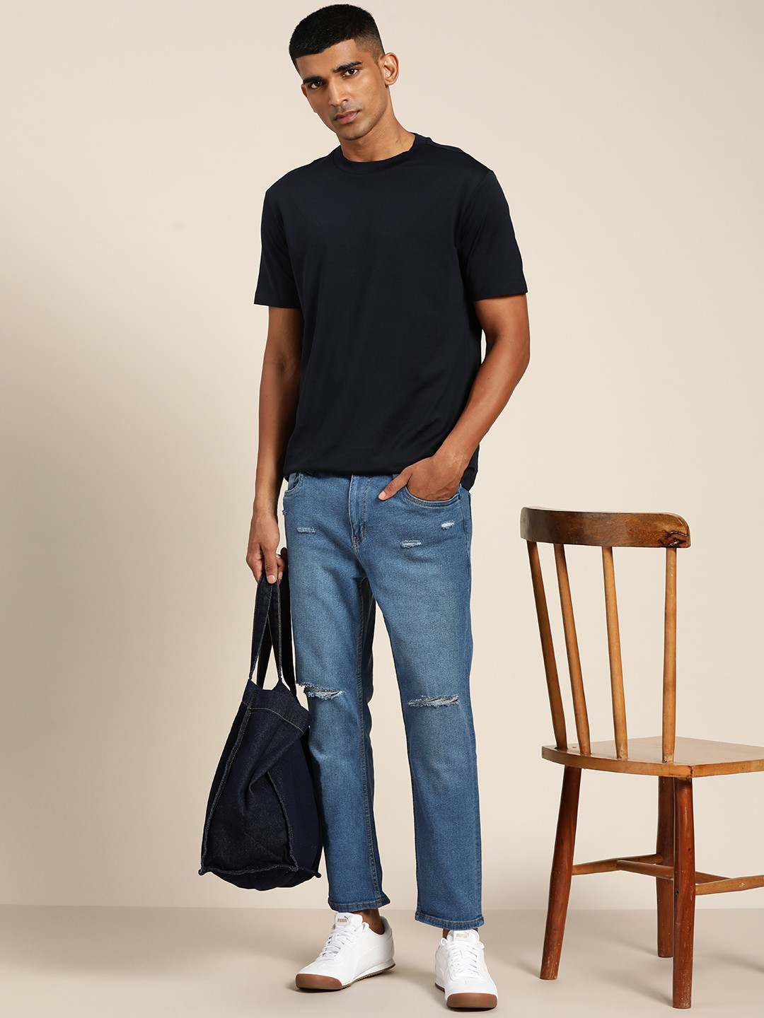 

ether Men Blue Slim Tapered Fit Slash Knee Light Fade Stretchable Jeans