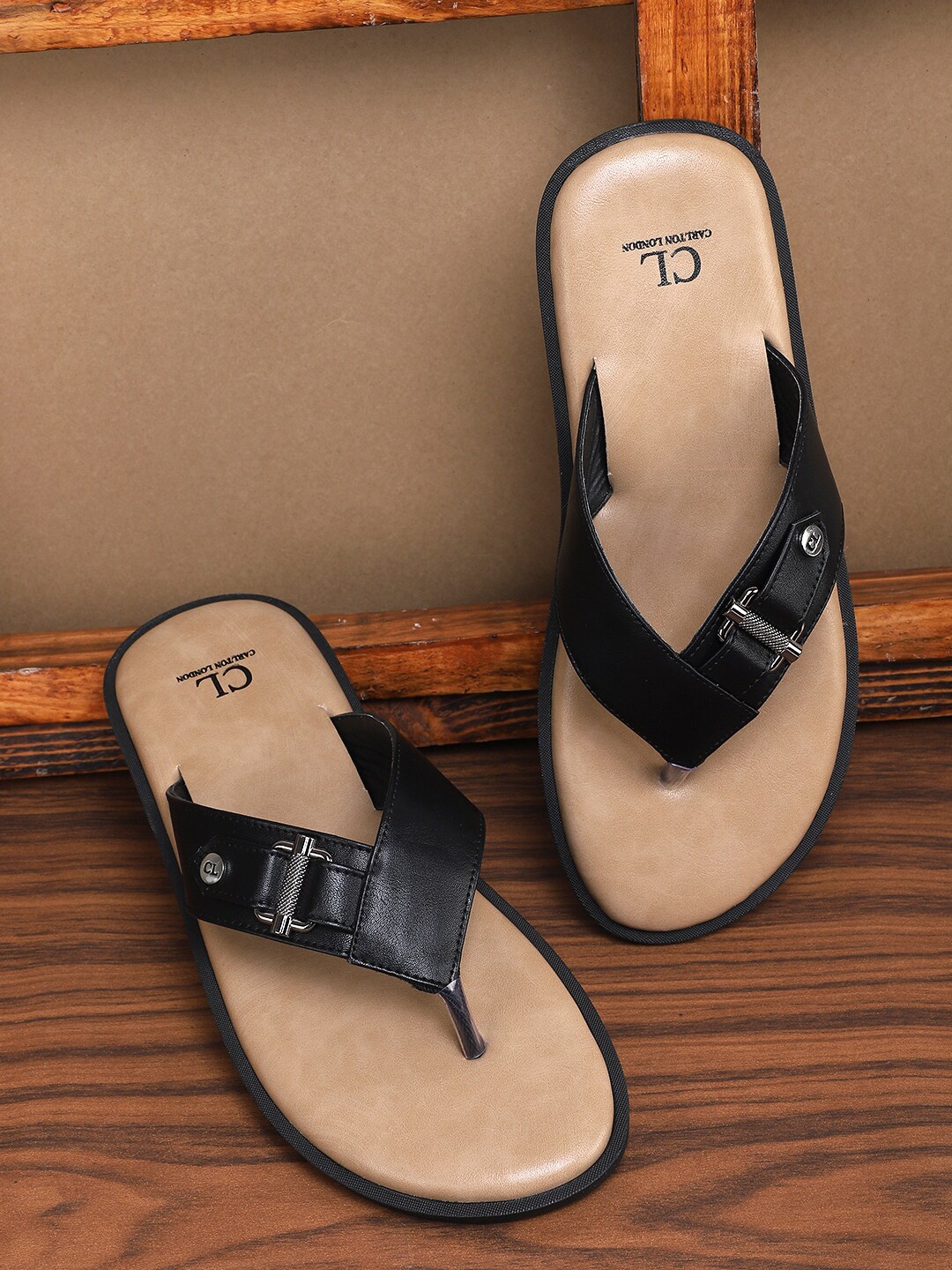 

Carlton London Men Beige & Black Comfort Sandals