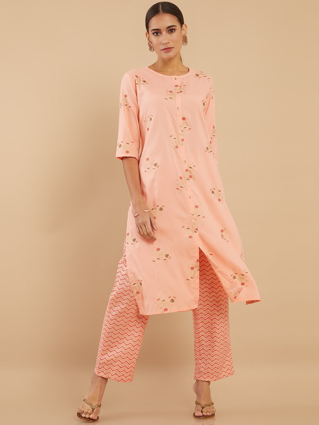 

Soch Women Peach-Coloured Floral Printed Panelled Kurta With Trousers