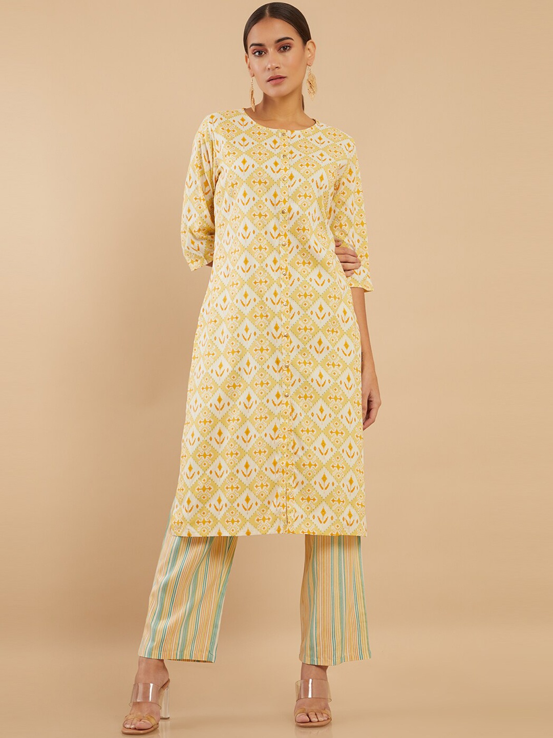 

Soch Women Yellow Printed Kurti with Trousers