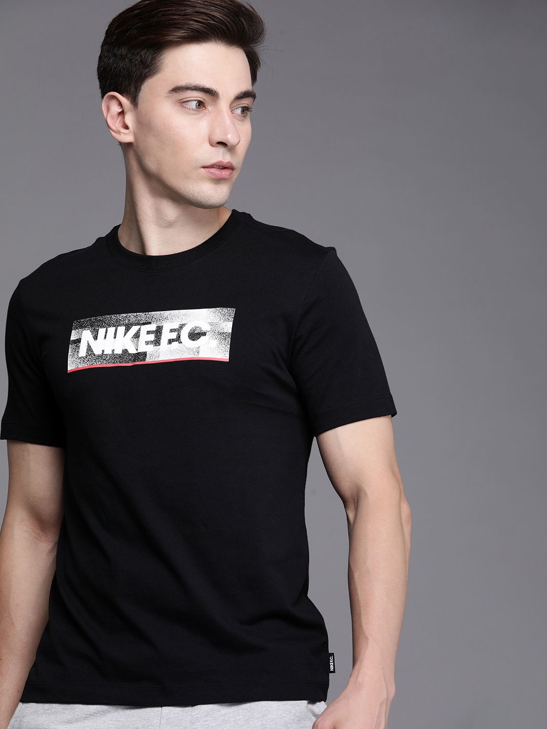 

Nike Men Black & White Brand Logo Printed Pure Cotton Football T-shirt