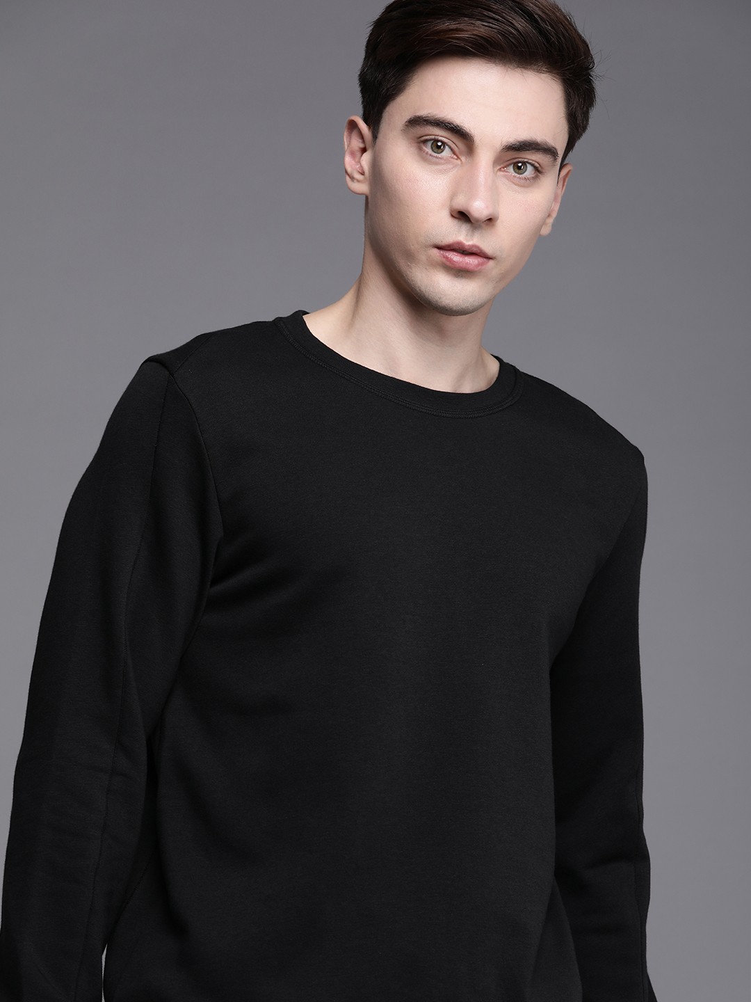

Nike Men Black Solid Round Neck Yoga T-shirt