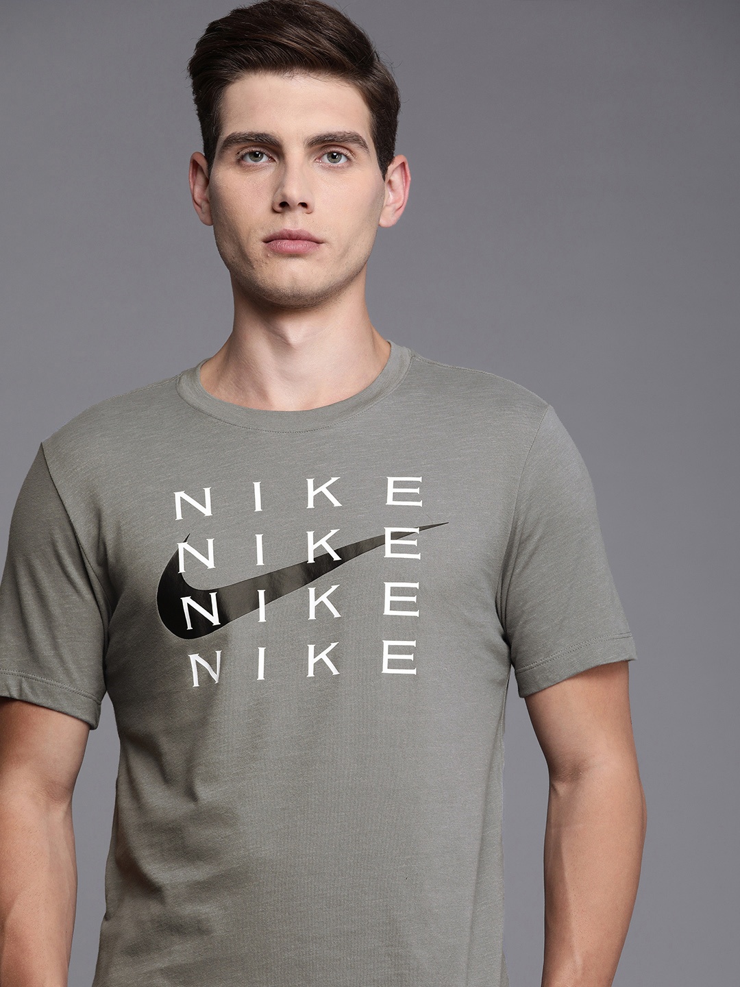 

Nike Men Grey & White Brand Logo Printed Round Neck Training T-shirt