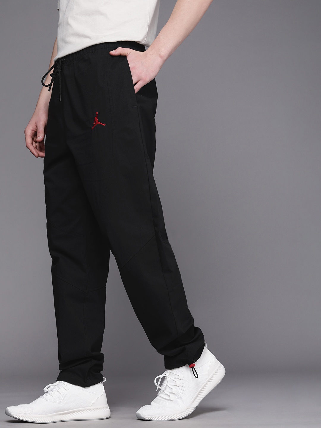 

Nike Jordan Essential Men's Black Solid Woven Track Pants