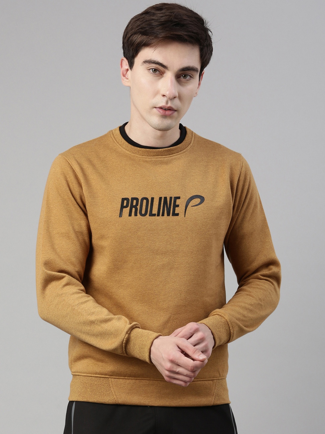 

Proline Men Mustard Yellow Printed Sweatshirt