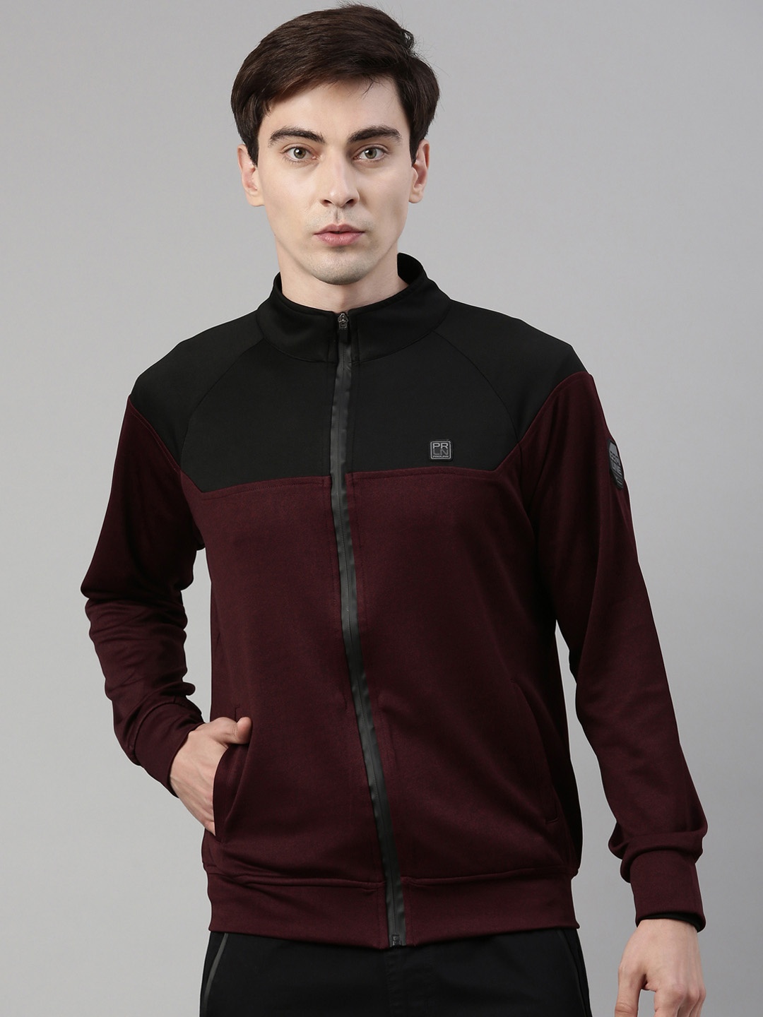 

Proline Men Maroon & Black Colourblocked Front-Open Sweatshirt