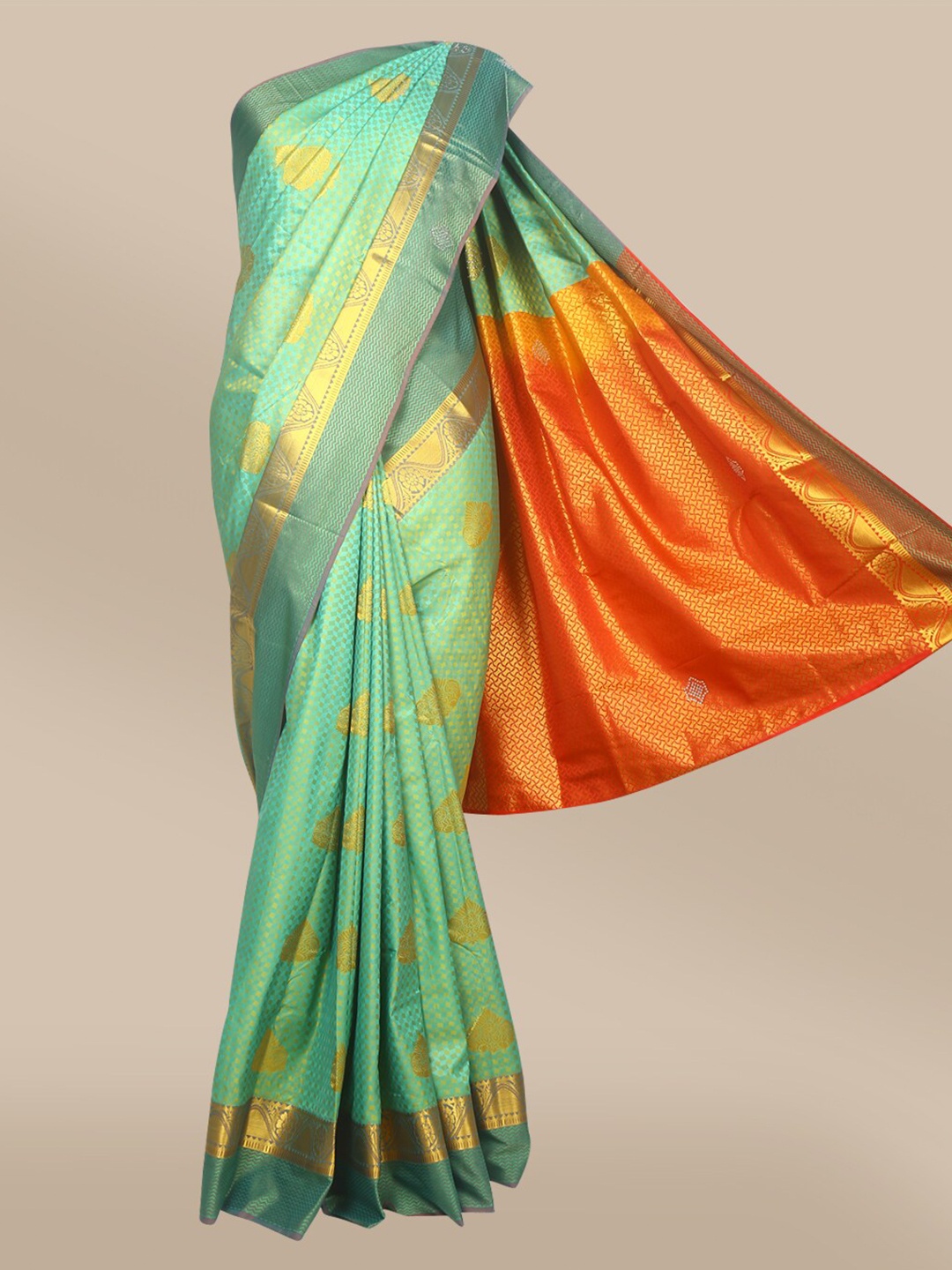 

The Chennai Silks Green & Gold-Toned Ethnic Motifs Zari Art Silk Saree