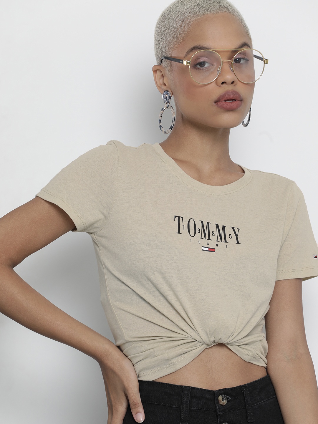 

Tommy Hilfiger Women Beige Brand Logo Printed Slim Fit T-shirt
