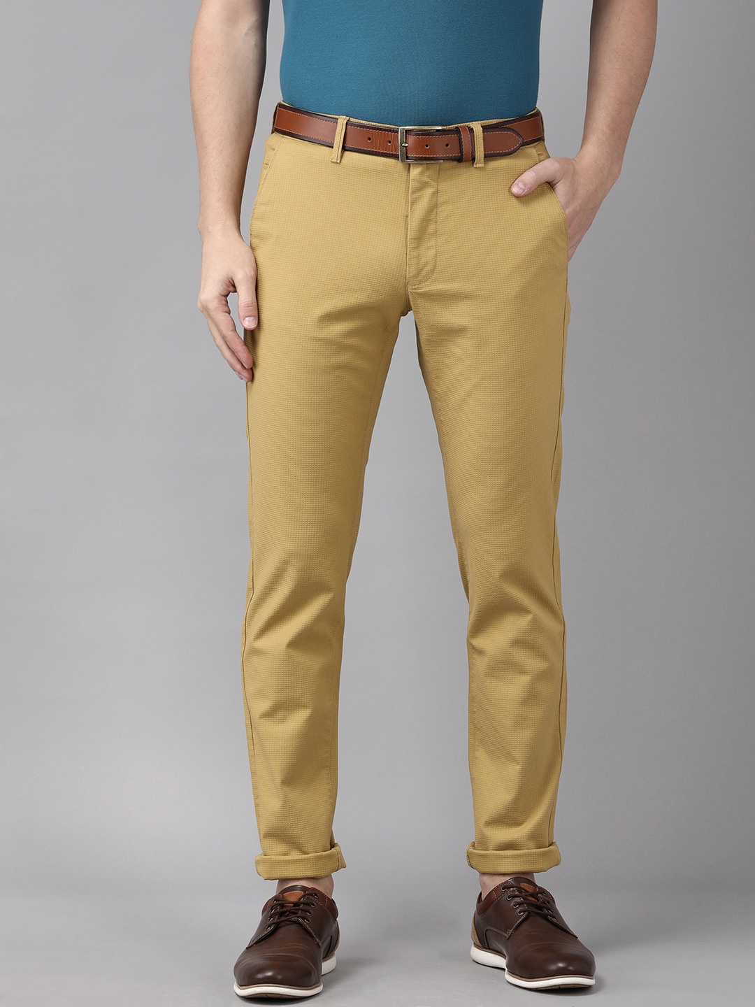 

Van Heusen Sport Men Beige Textured Tapered Fit Low-Rise Trousers