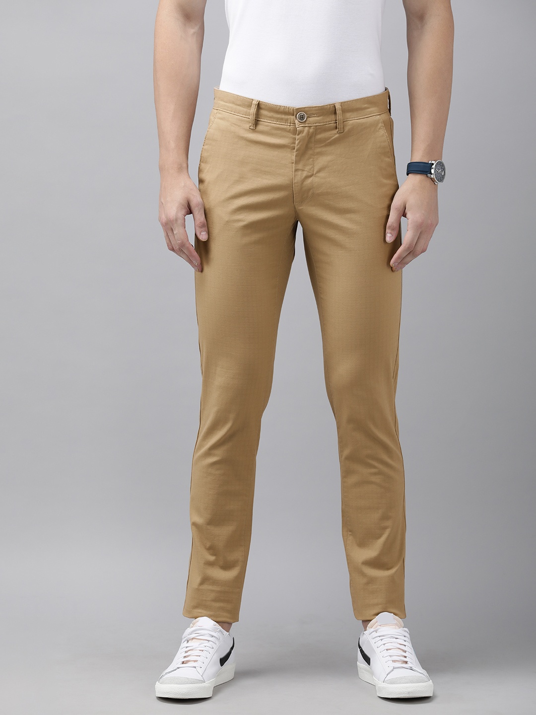 

Van Heusen Sport Men Beige Tapered Fit Low-Rise Regular Trousers
