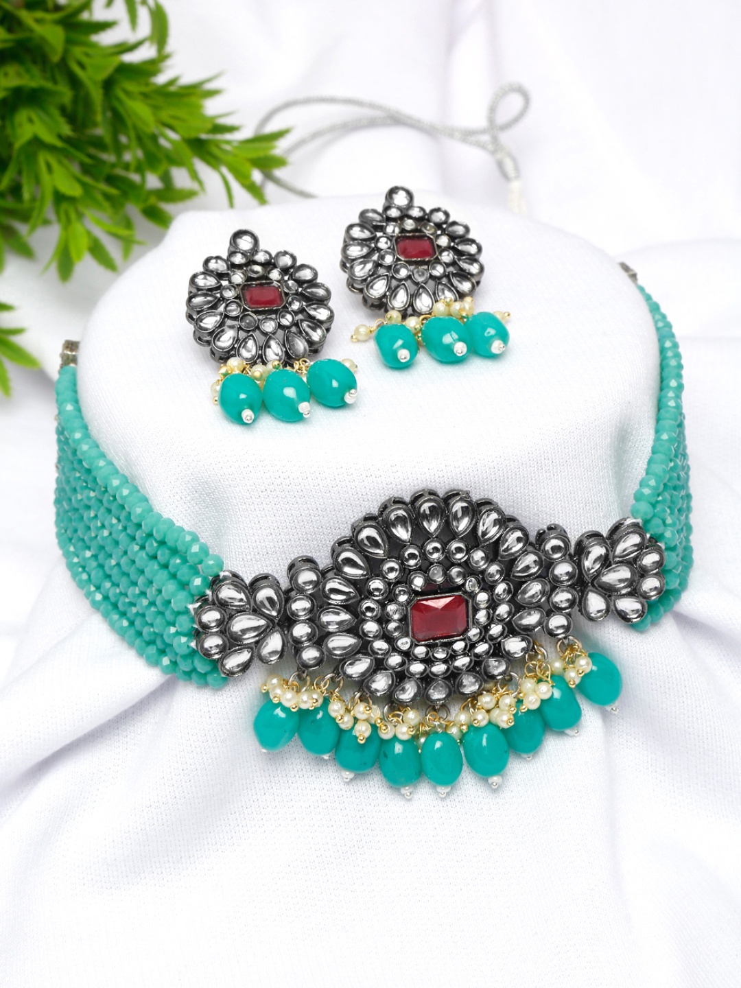 

Yellow Chimes Gold-Plated Sea Green Kundan-Studded & Beaded Layered Choker Set