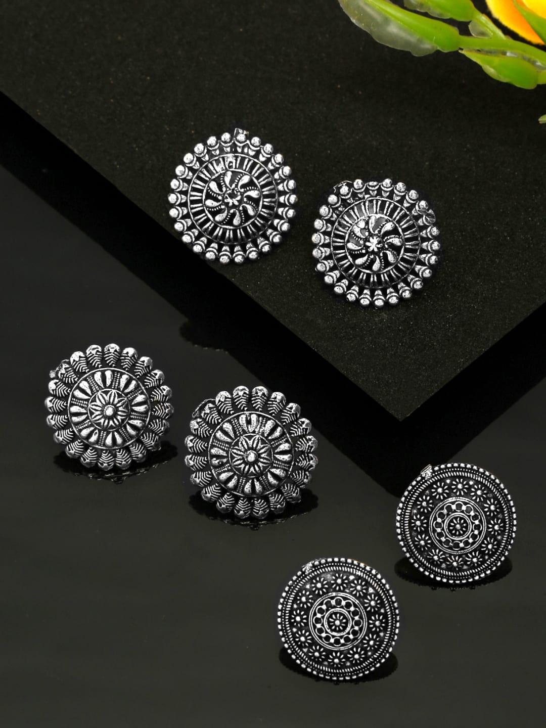 

Yellow Chimes Silver-Toned Circular Studs Earrings
