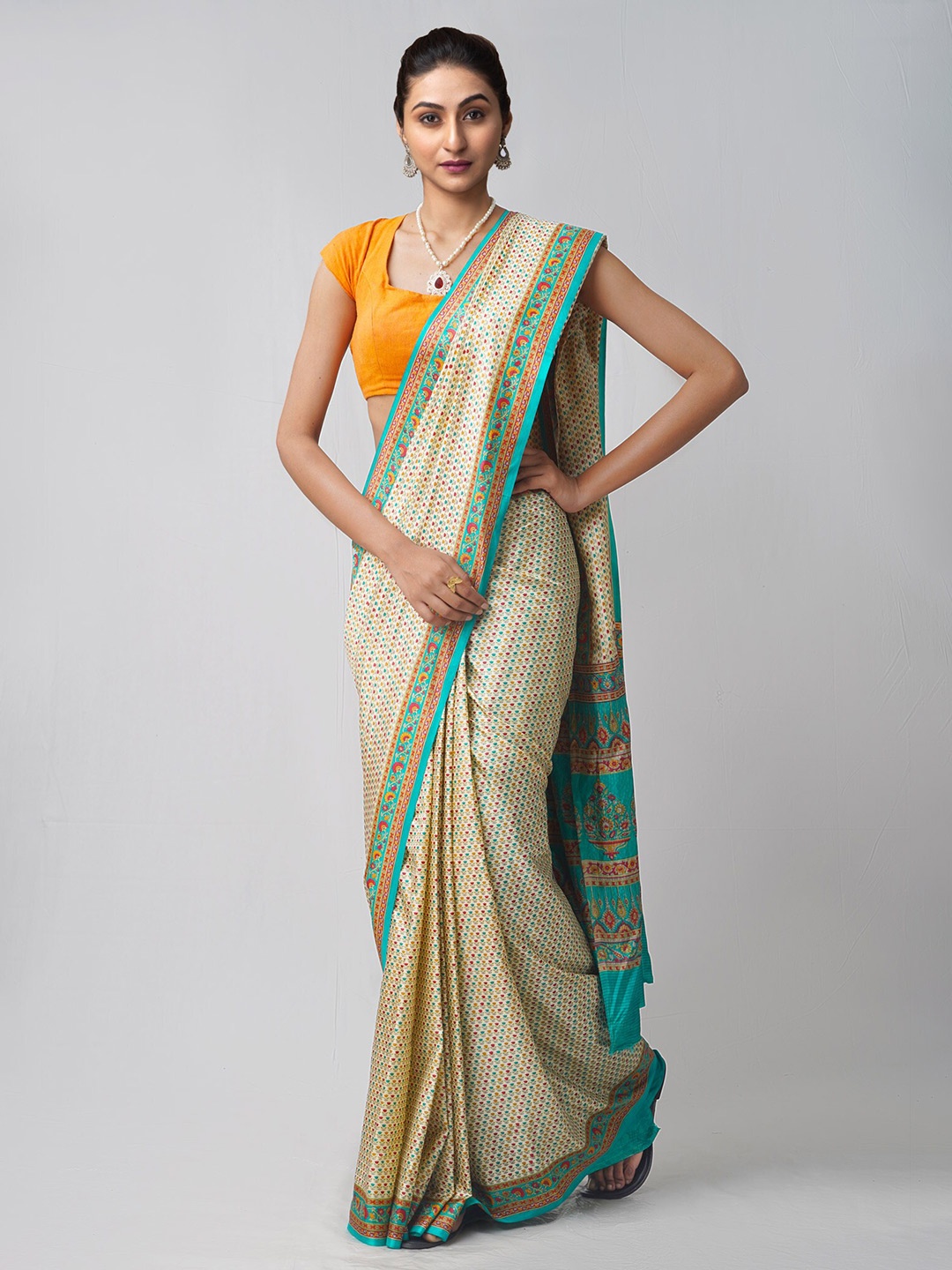 

Unnati Silks Cream-Coloured & Green Floral Silk Blend Mysore Silk Saree