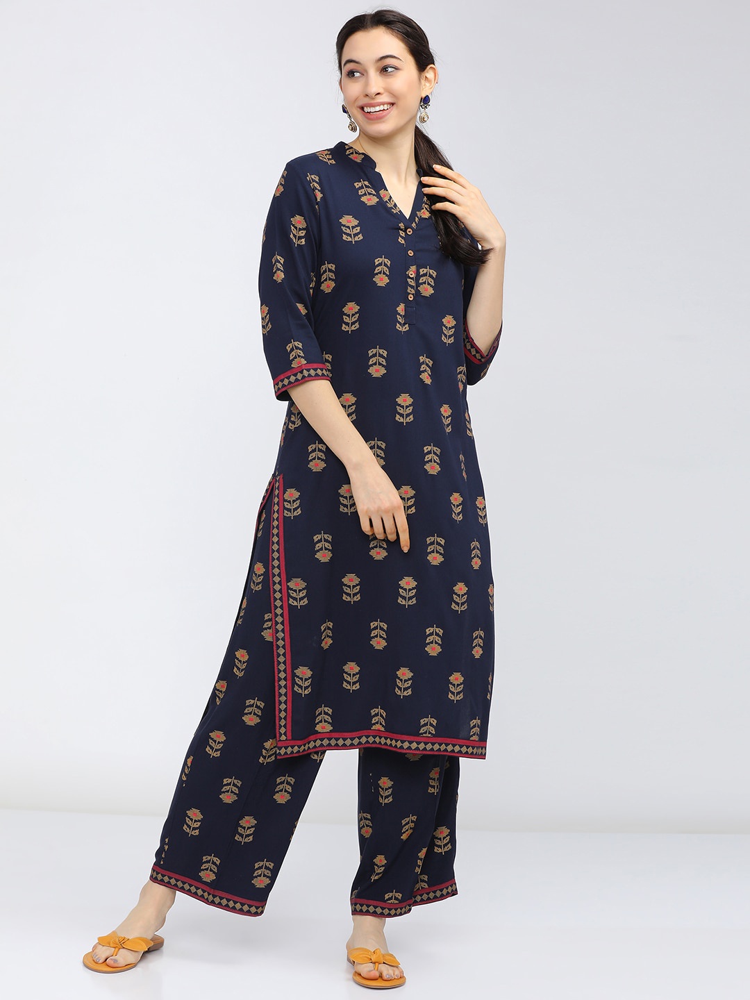 

Vishudh Women Navy Blue Floral Printed Kurta with Palazzos