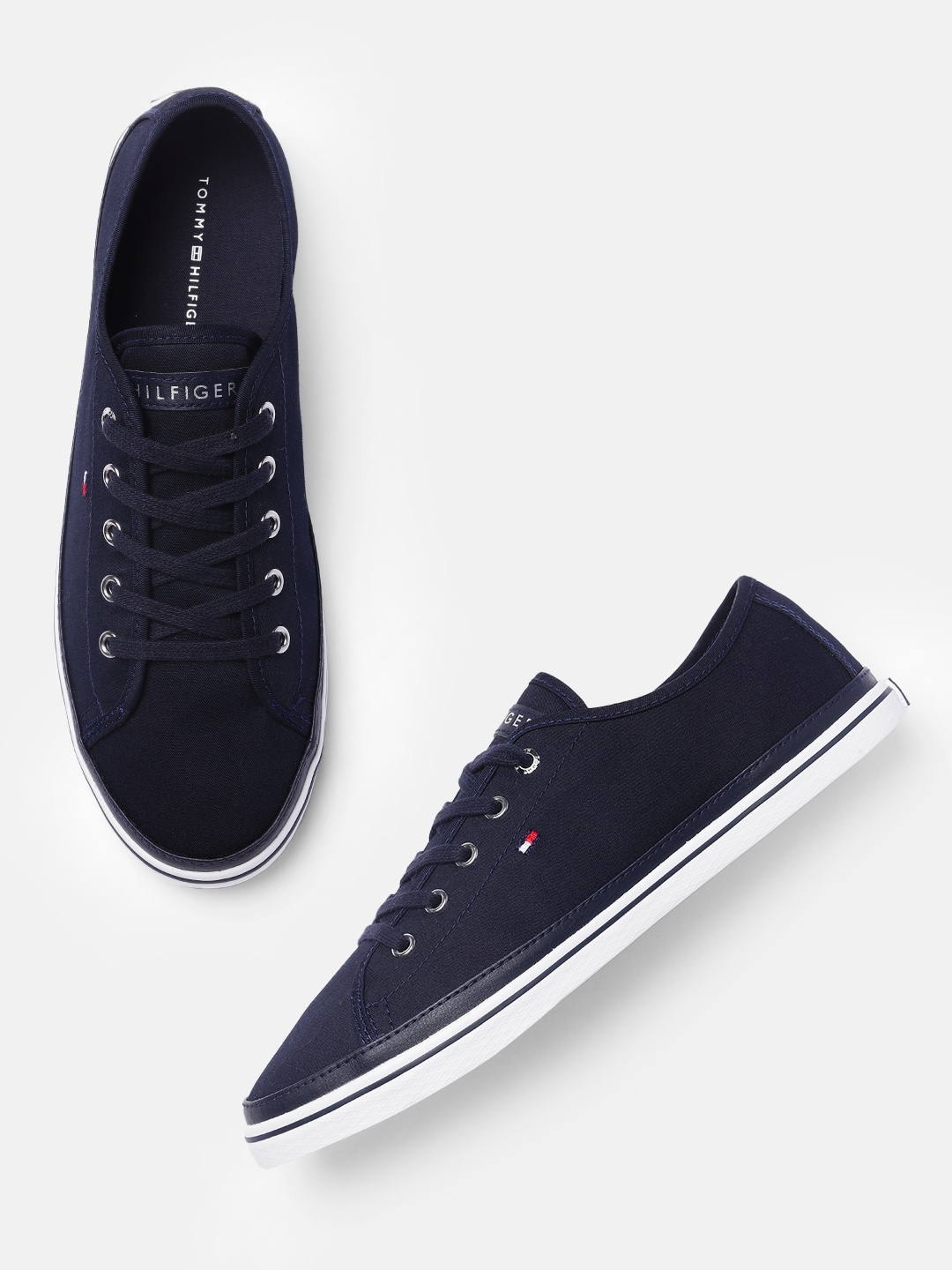 

Tommy Hilfiger Women Navy Blue Solid Sneakers
