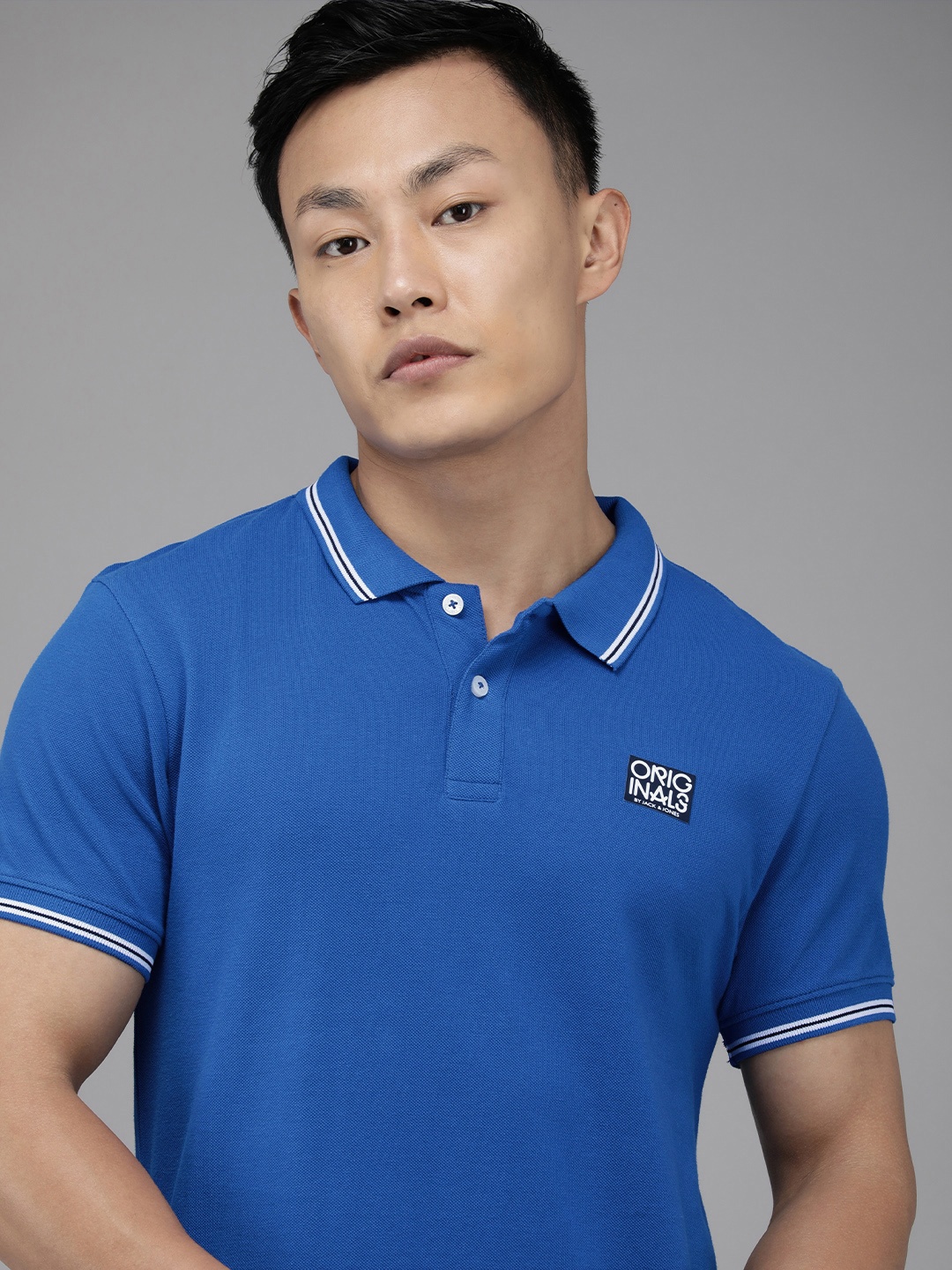 

Jack & Jones Men Blue Printed Polo Collar Slim Fit Pure Cotton Casual T-shirt