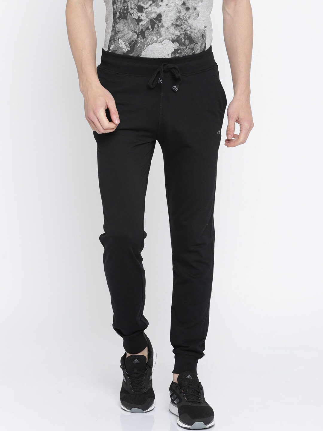 

Sweet Dreams Men Black Solid Track Pants