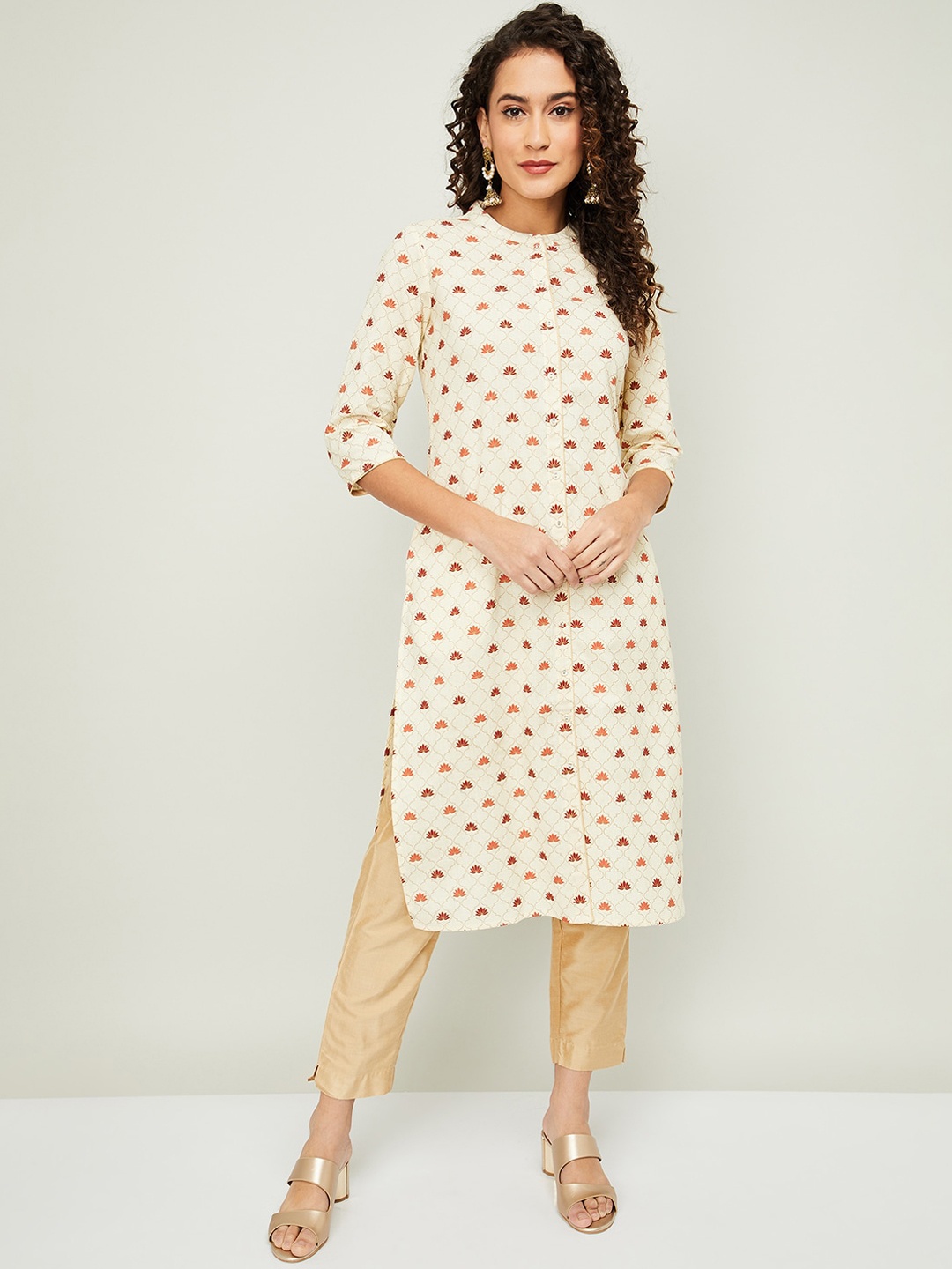 

Melange by Lifestyle Women Beige & Orange Ethnic Motifs Printed Straight Kurta