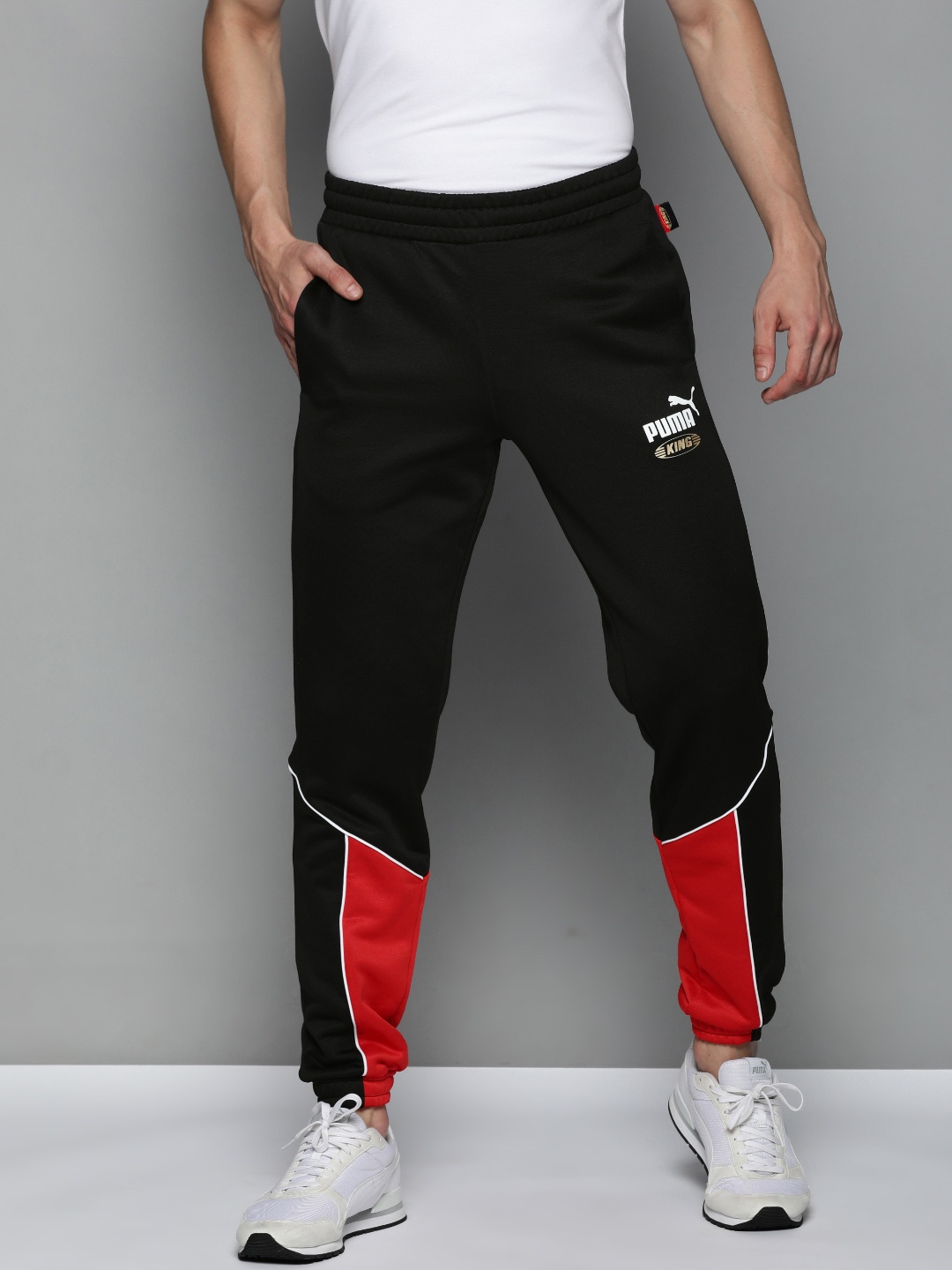 

Puma Men Black& Red Colourblocked King Sustainable Regular Fit Joggers