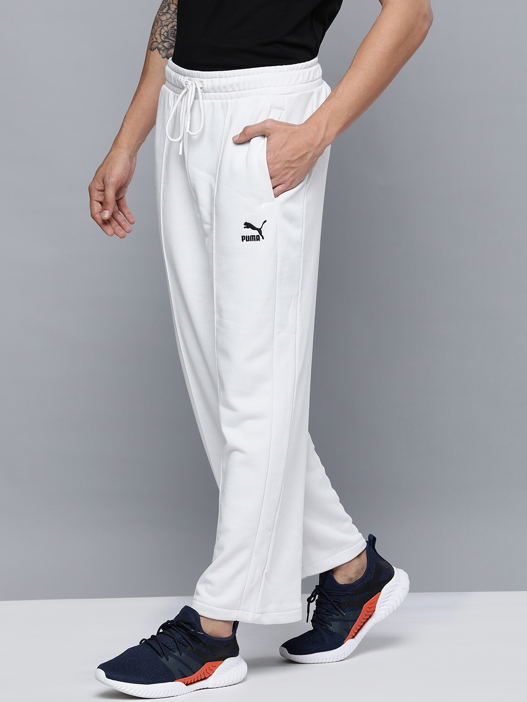 

Puma Men White & Black Classics Dad Solid Track Pants