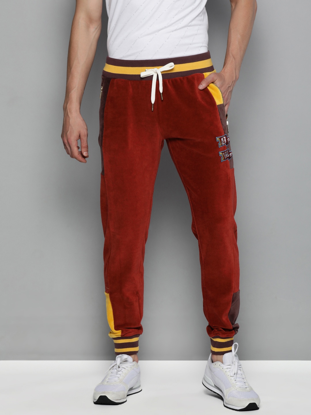 

Puma Men Red & Yellow Brand Logo Printed TYE Prime Velour Joggers