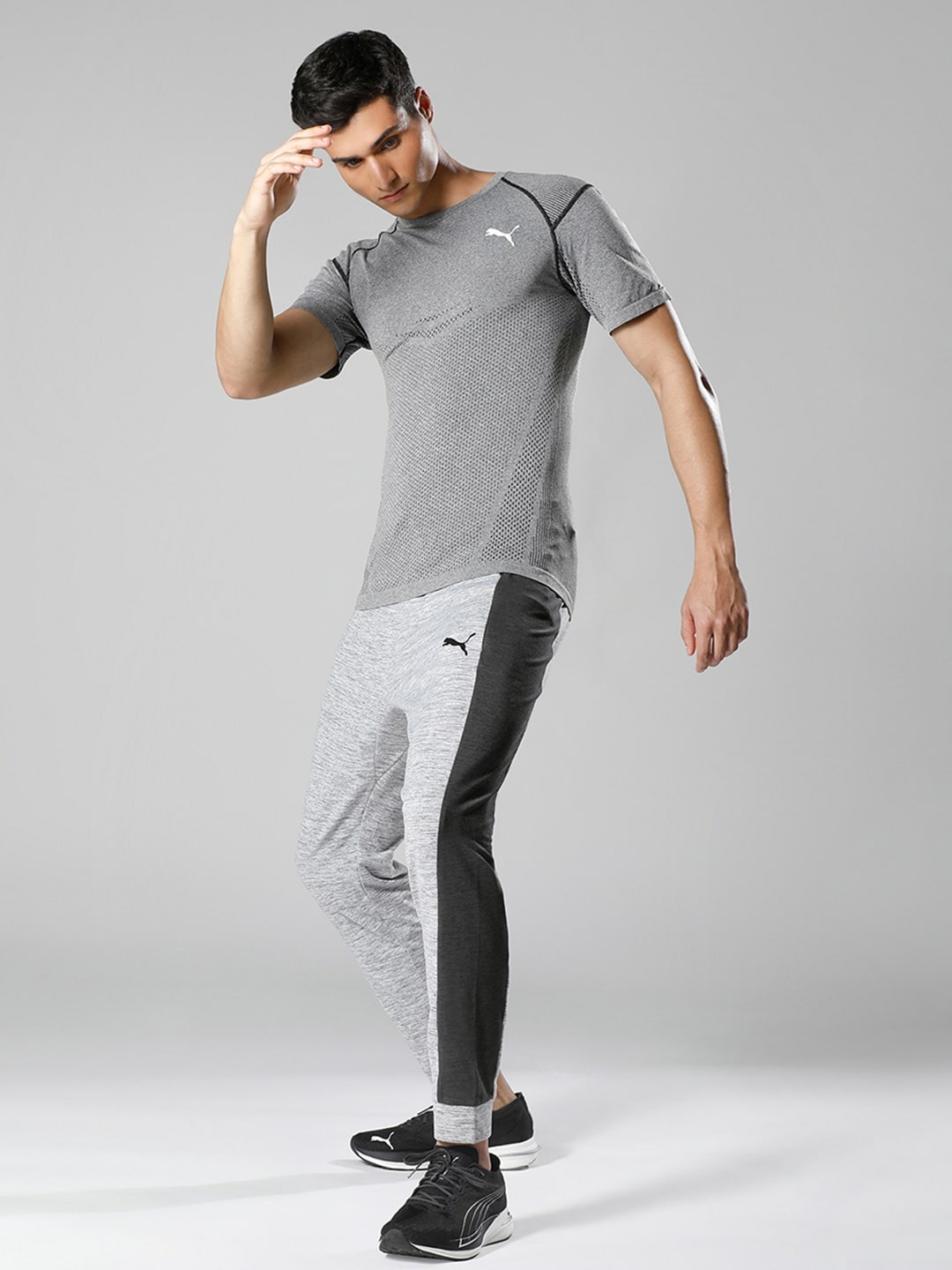 

Puma Men Grey Melange Solid CLOUDSPUN Stretchable Training Joggers with Side Taping Detail