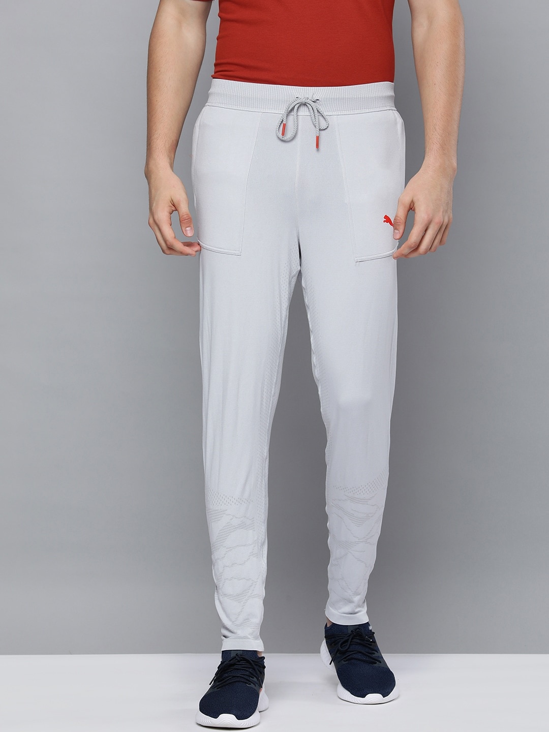 

Puma Men GreyBran Logo Printed Slim Fit Mid Rise Evoknit Training Pants, Grey