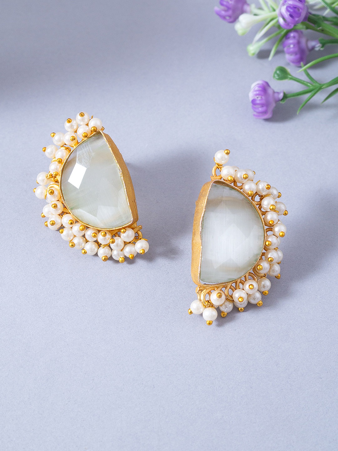 

Golden Peacock Gold-Toned & Off White Stone Studded & Beaded Crescent Shaped Drop Earrings