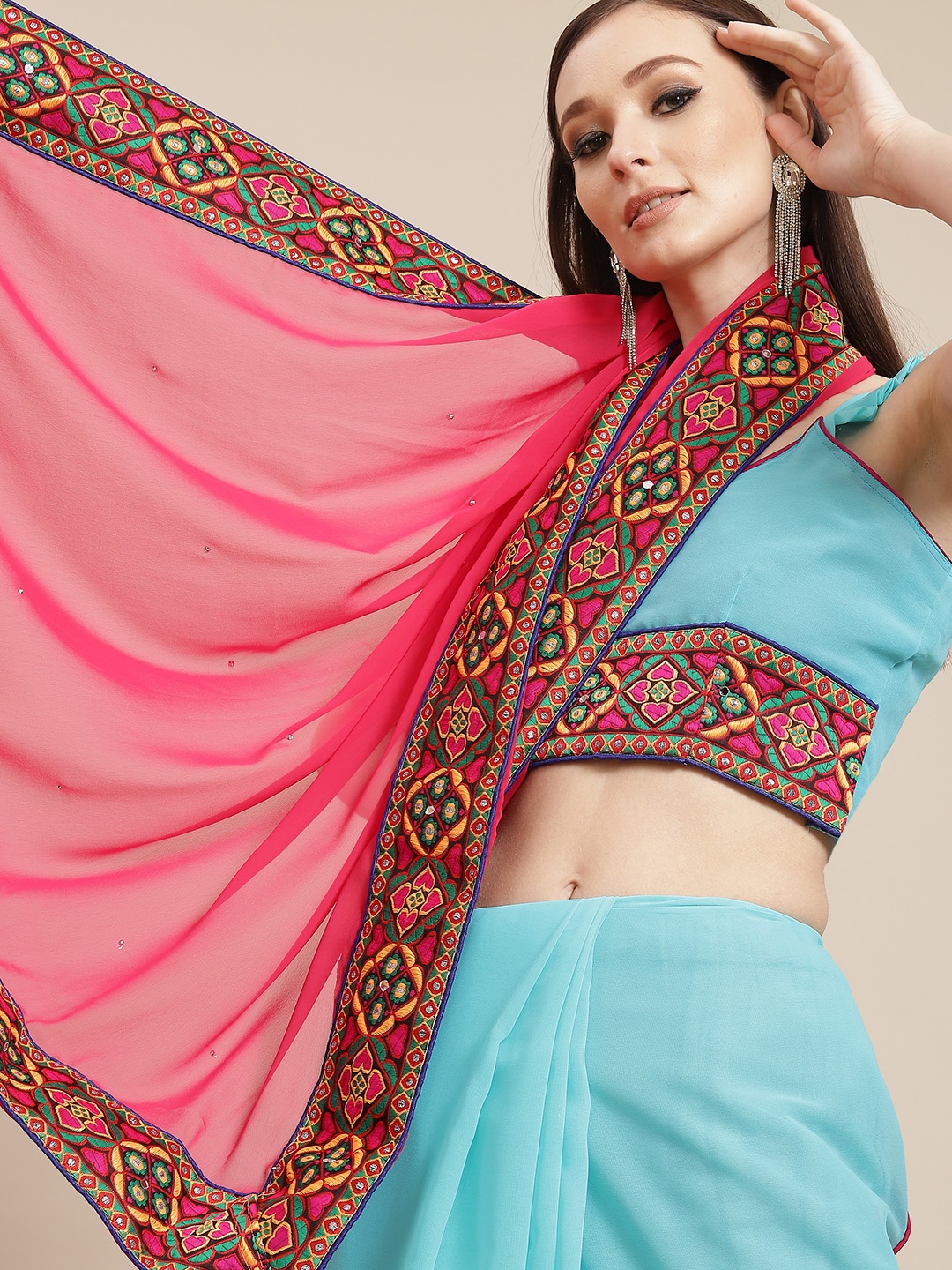 

Mitera Blue & Pink Ethnic Motifs Embroidered Pure Georgette Saree