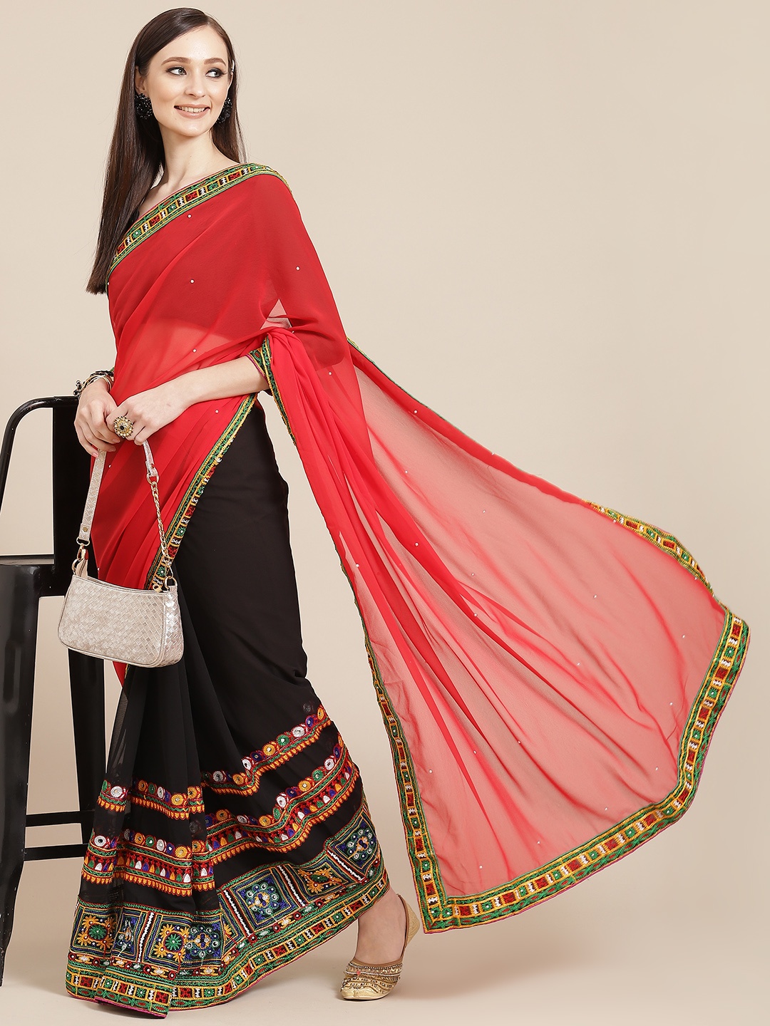 

Mitera Black & Red Ethnic Motifs Embroidered Pure Georgette Saree