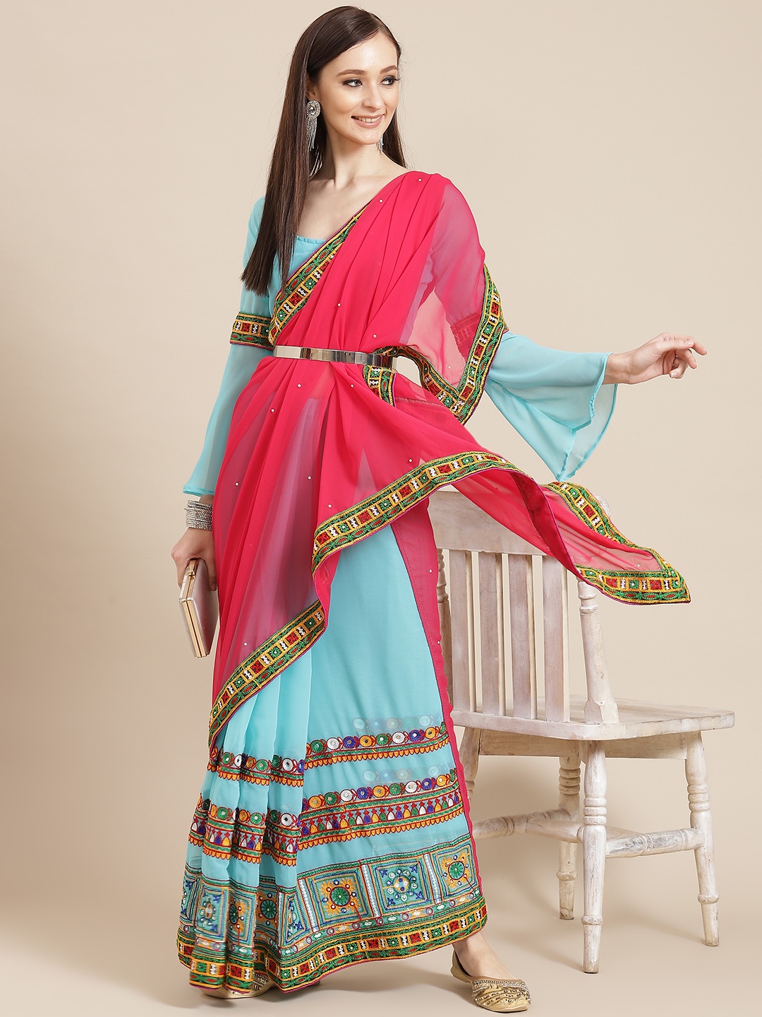 

Mitera Blue & Pink Ethnic Motifs Embroidered Pure Georgette Saree