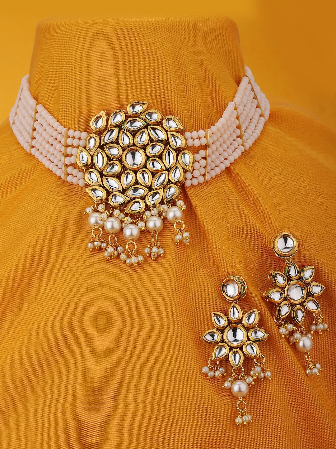 

KOLHA-BY CARLTON Women Gold-Plated Off-White Kundan Jewellery Set