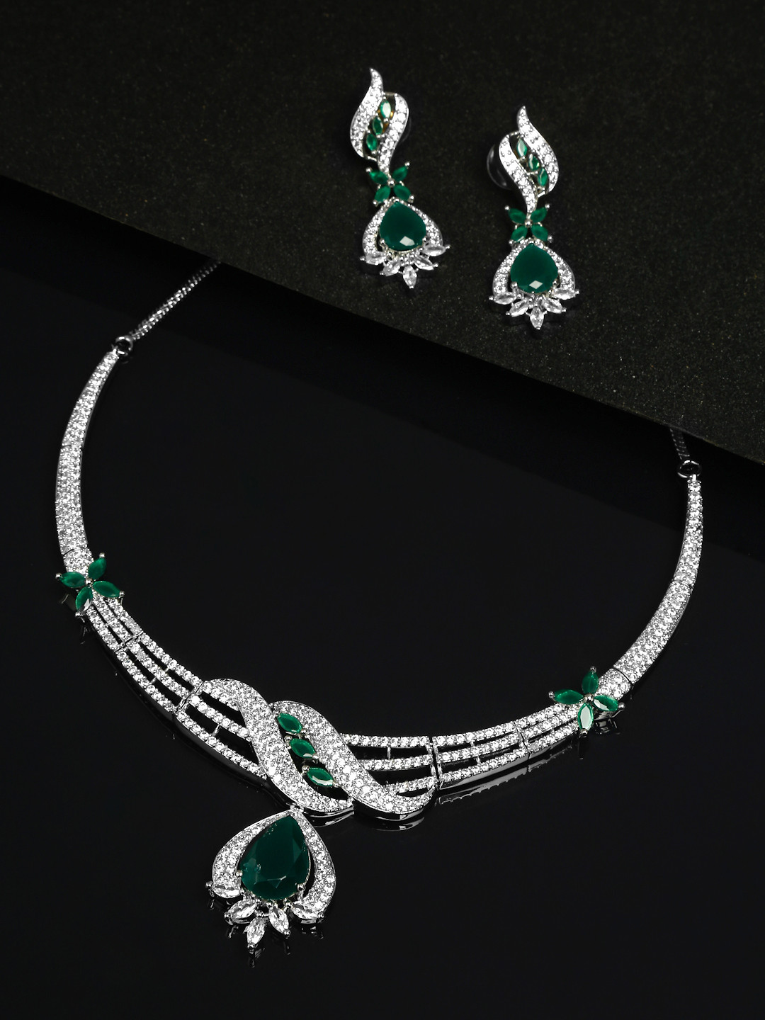

Yellow Chimes Rhodium-Plated White & Green Stone Studded Jewellery Set