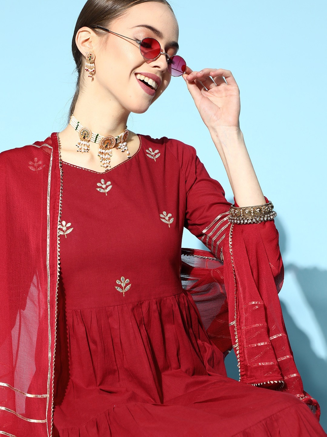 

Jaipur Kurti Solid Pure Cotton Short Kurti with Flared Pants, Maroon