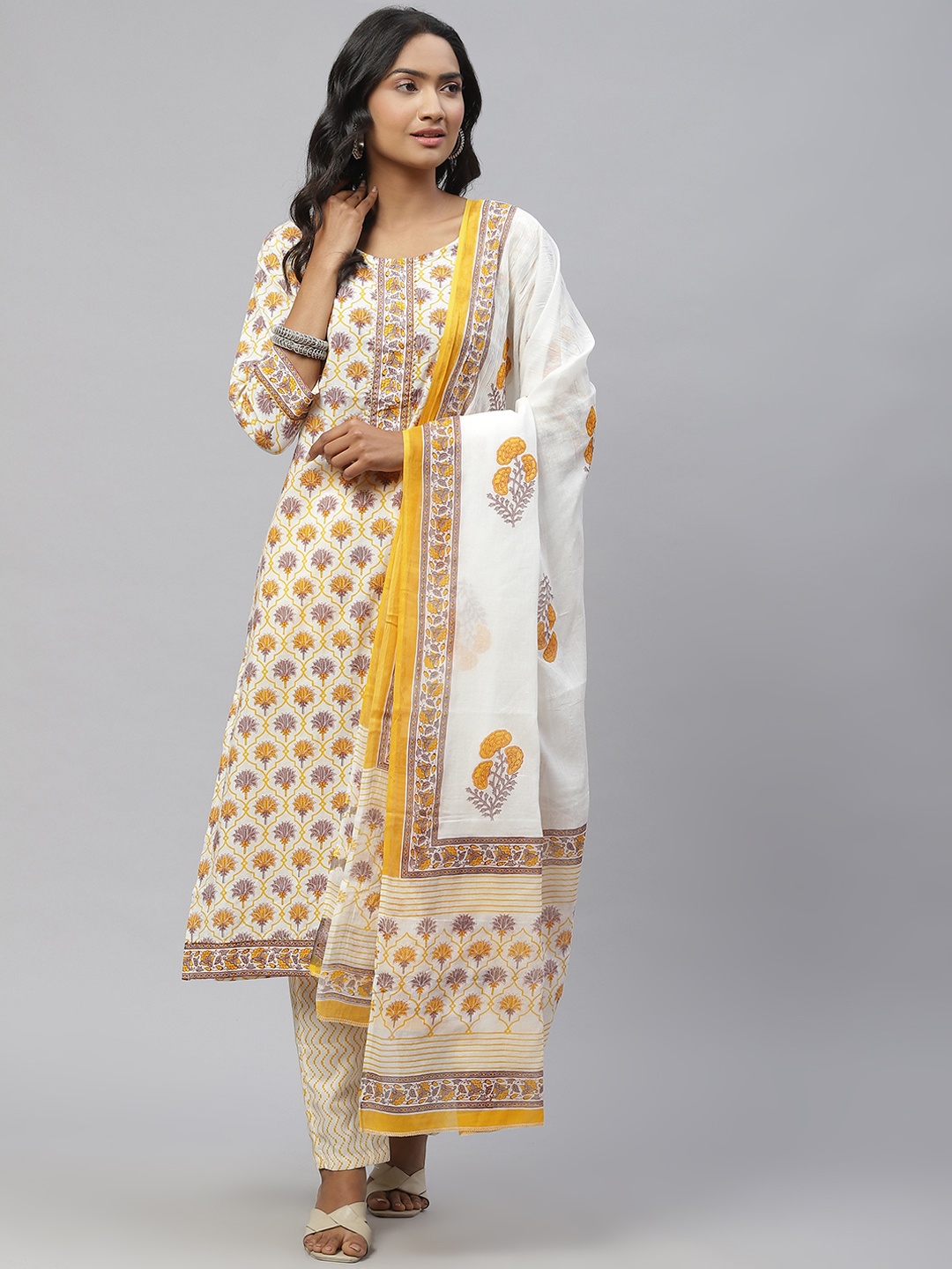 

Sasimo Women White & Yellow Ethnic Motifs Printed Gotta Patti Pure Cotton Kurta Set