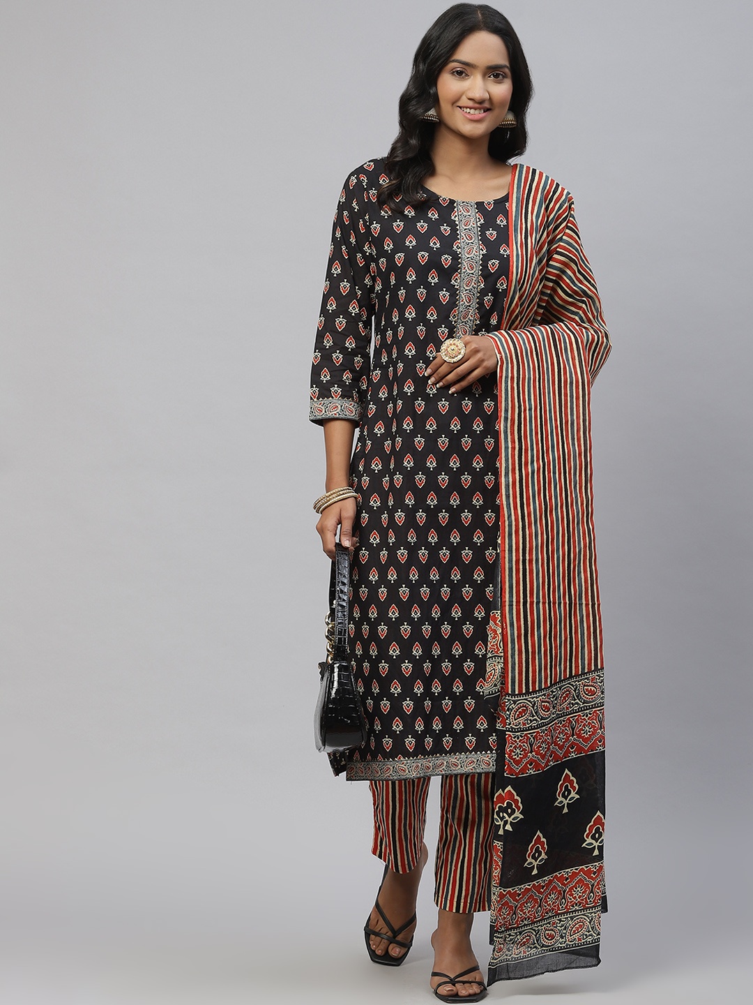 

Sasimo Women Black & Orange Ethnic Motifs Printed Gotta Patti Kurta Set