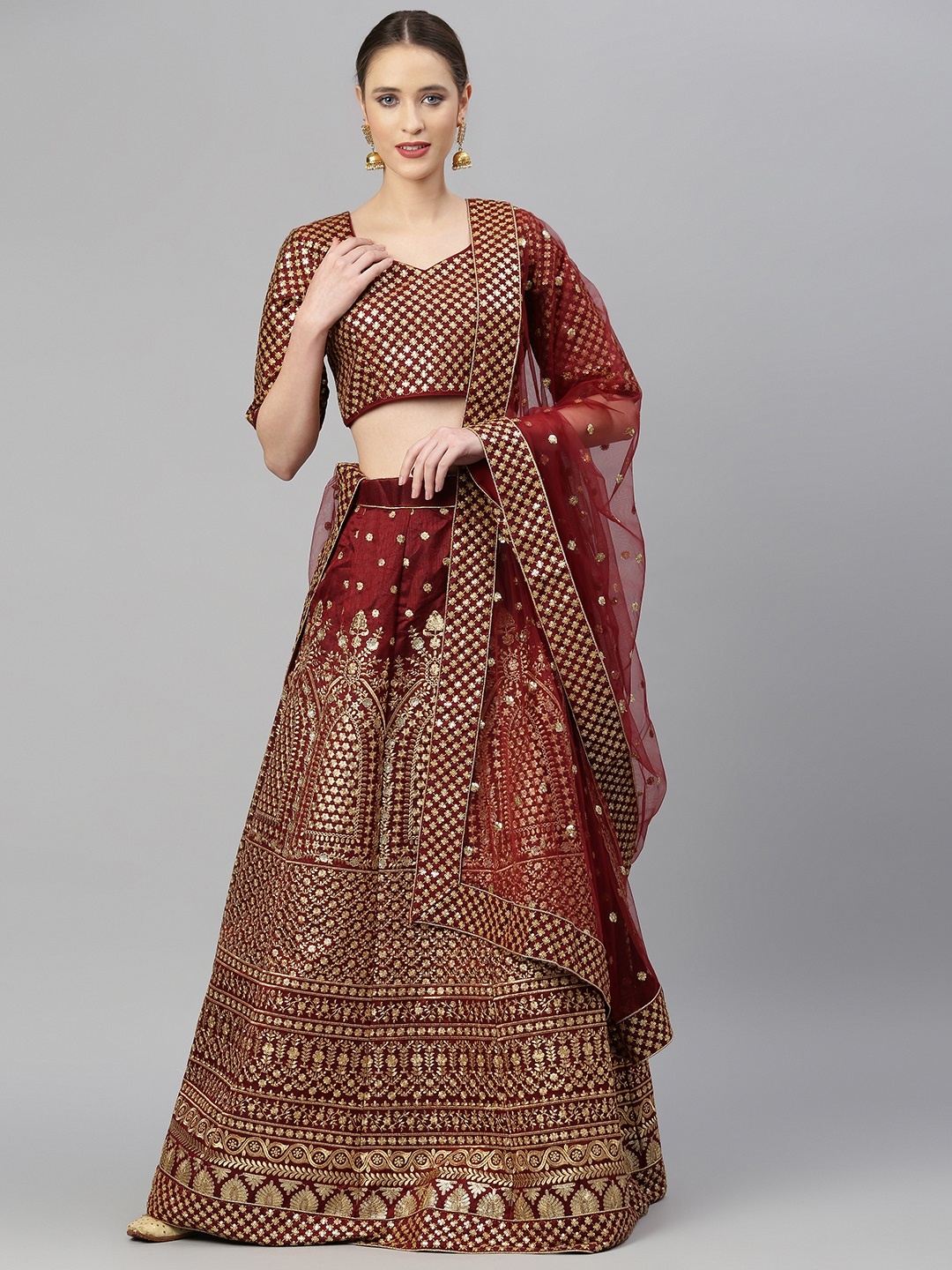 

Readiprint Fashions Maroon & Gold-Toned Semi-Stitched Lehenga & Unstitched Blouse