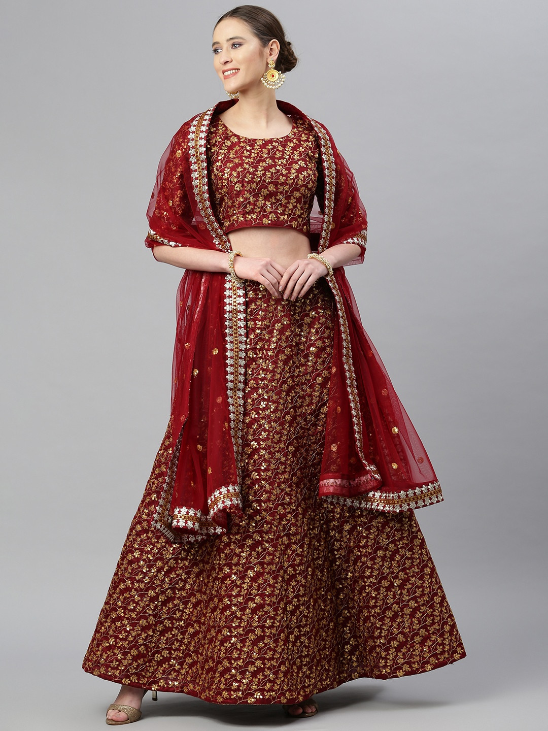 

Readiprint Fashions Maroon & Gold-Toned Semi-Stitched Lehenga & Unstitched Blouse