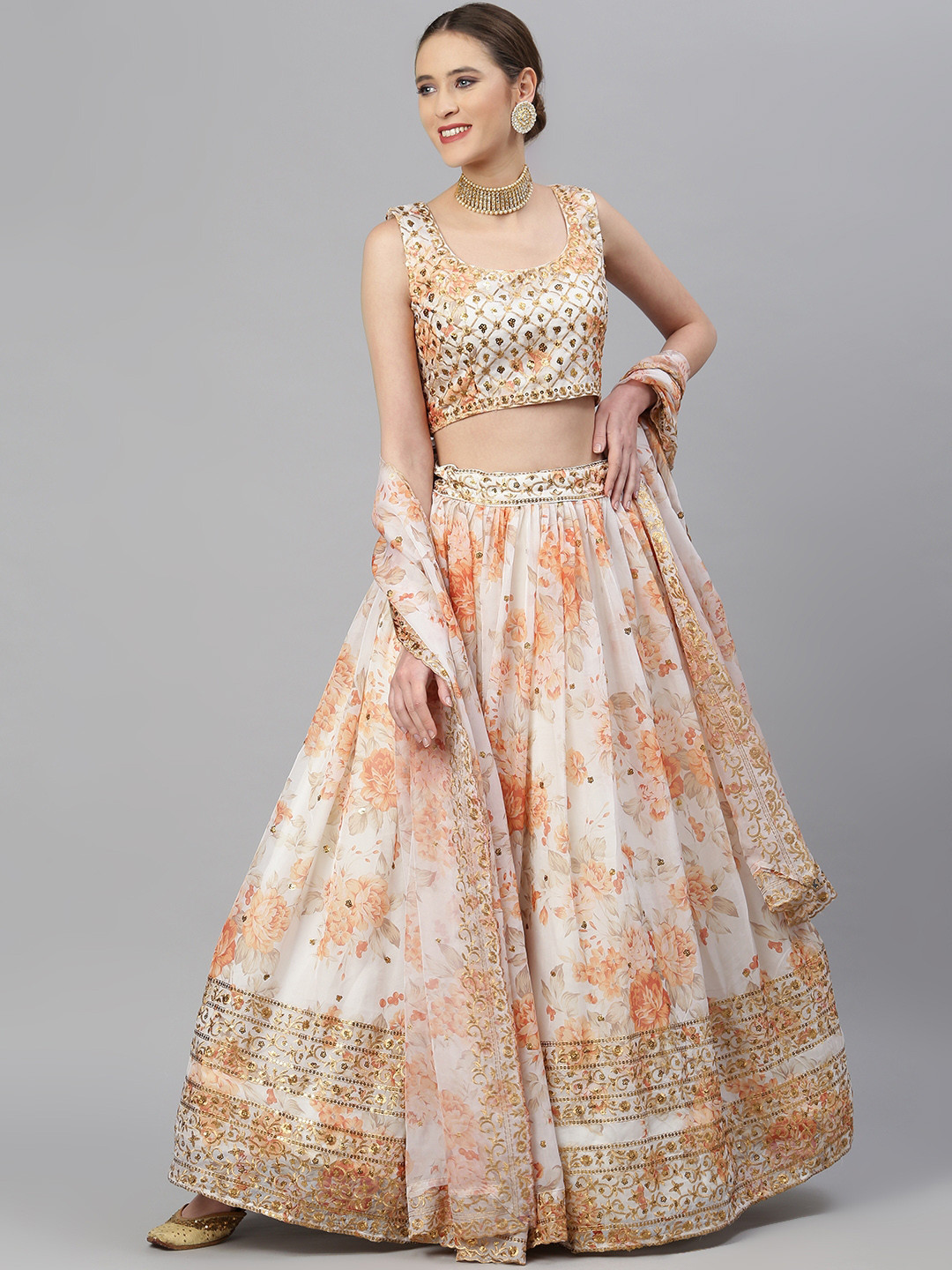 

Readiprint Fashions Off White & Peach-Coloured Embellished Sequinned Semi-Stitched Lehenga