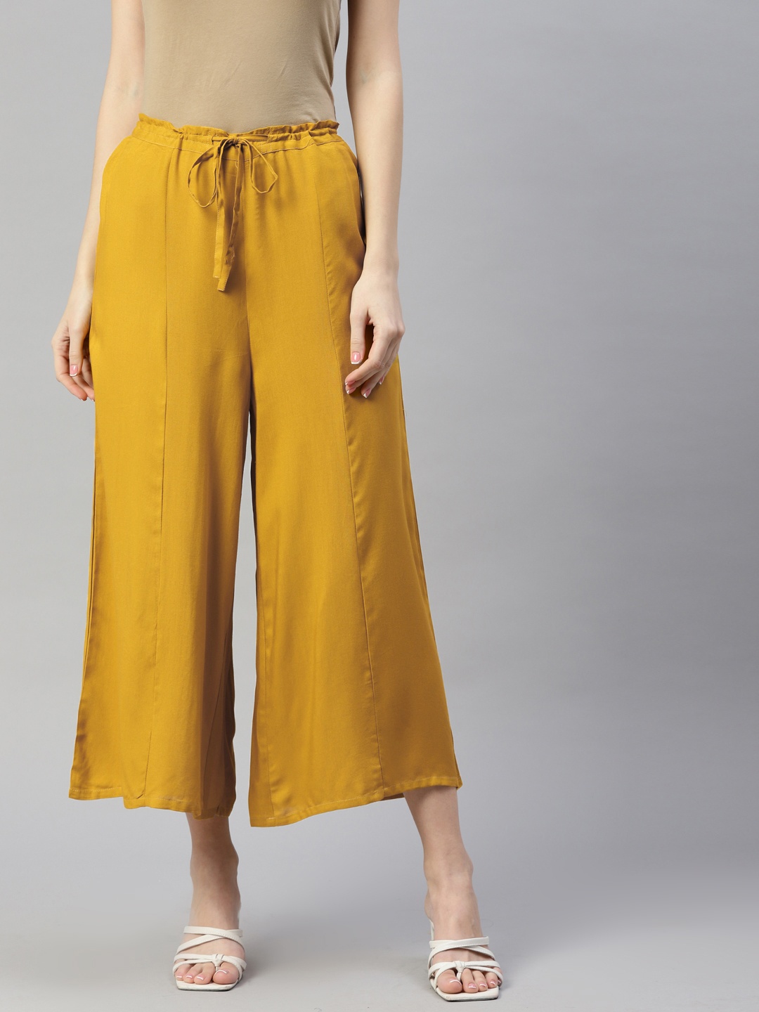 

Ayaany Women Mustard Yellow Cotton Flared Cropped Palazzos